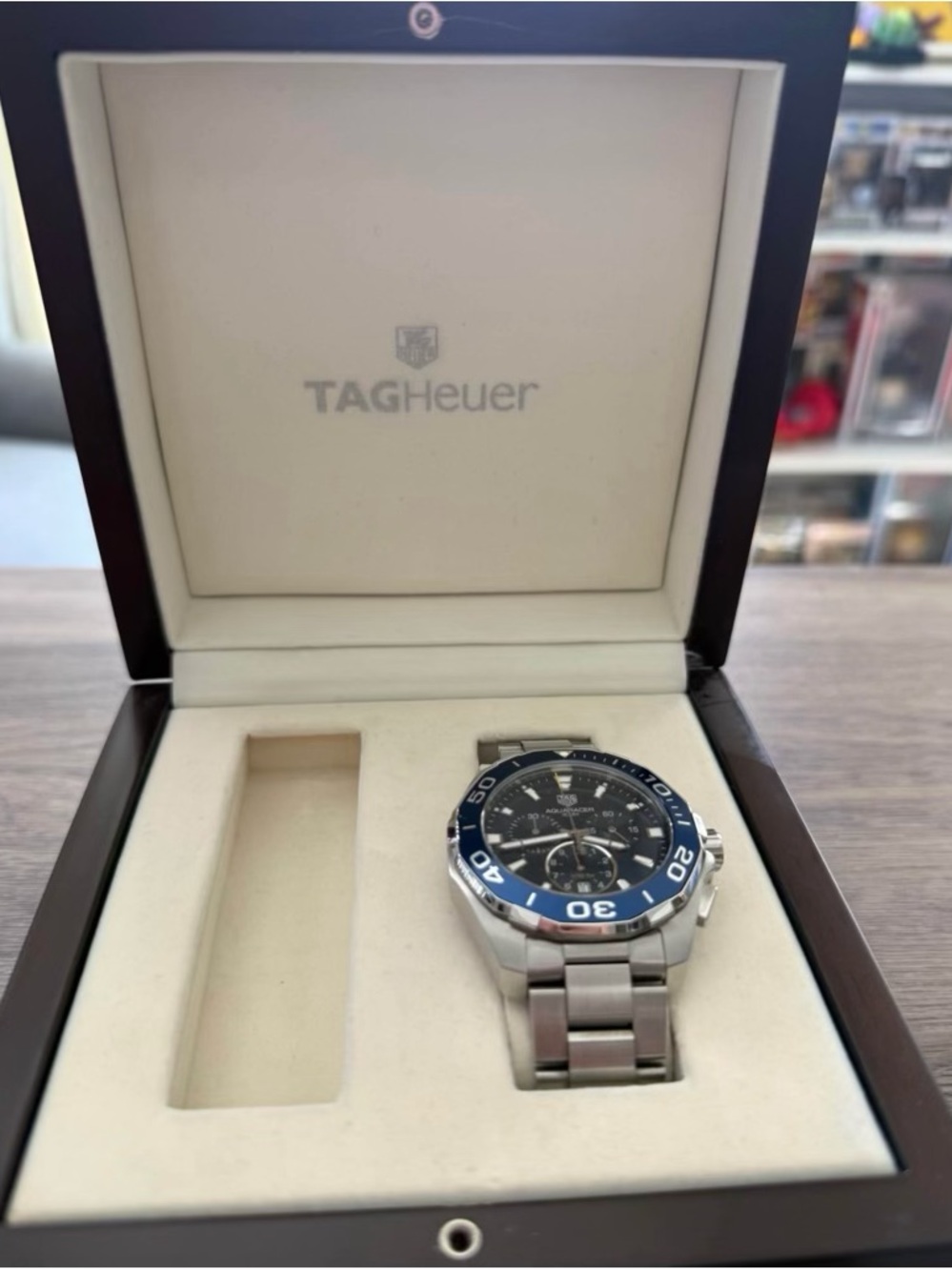 Tag Heuer Men's Stainless Steel Watch with Blue Bezel and Black Dial
